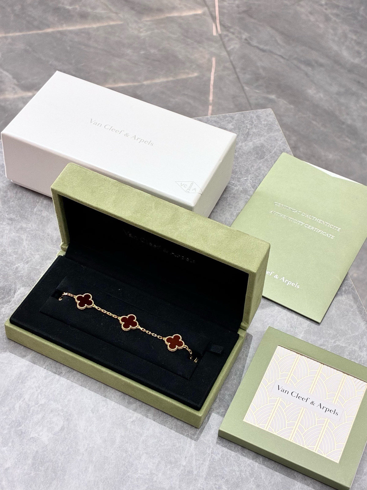 VAN CLEEF & ARPELS Vintage Alhambra Bracelet – Five Carnelian Motifs, 18K Yellow Gold, 2022 Warranty Card, Very Good Pre-Owned