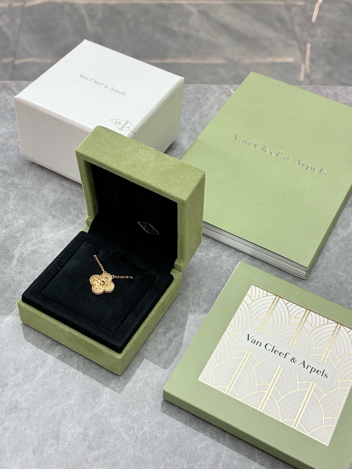 VAN CLEEF & ARPELS Vintage Alhambra Pendant – Yellow Gold with Textured Lava Finish, 2024 Warranty Card, Very Good Pre-Owned