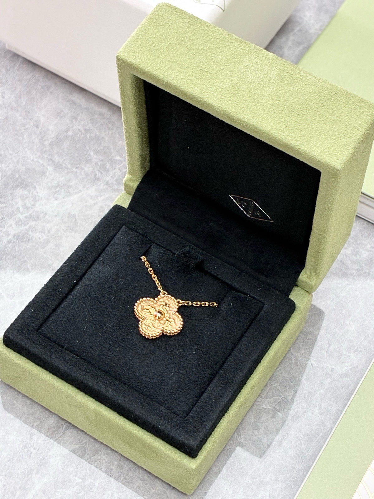 VAN CLEEF & ARPELS Vintage Alhambra Pendant – Yellow Gold with Textured Lava Finish, 2024 Warranty Card, Very Good Pre-Owned