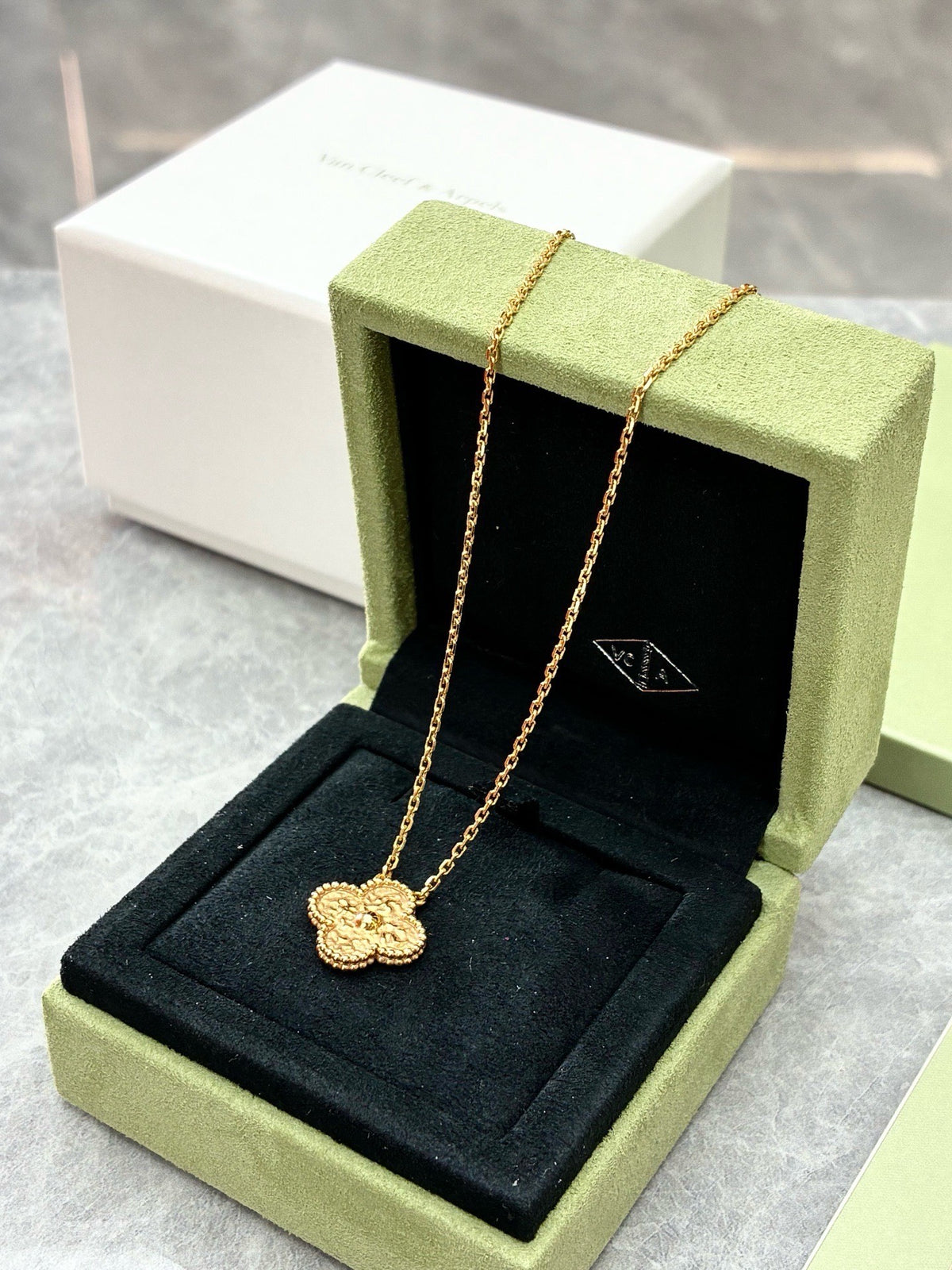 VAN CLEEF & ARPELS Vintage Alhambra Pendant – Yellow Gold with Textured Lava Finish, 2024 Warranty Card, Very Good Pre-Owned