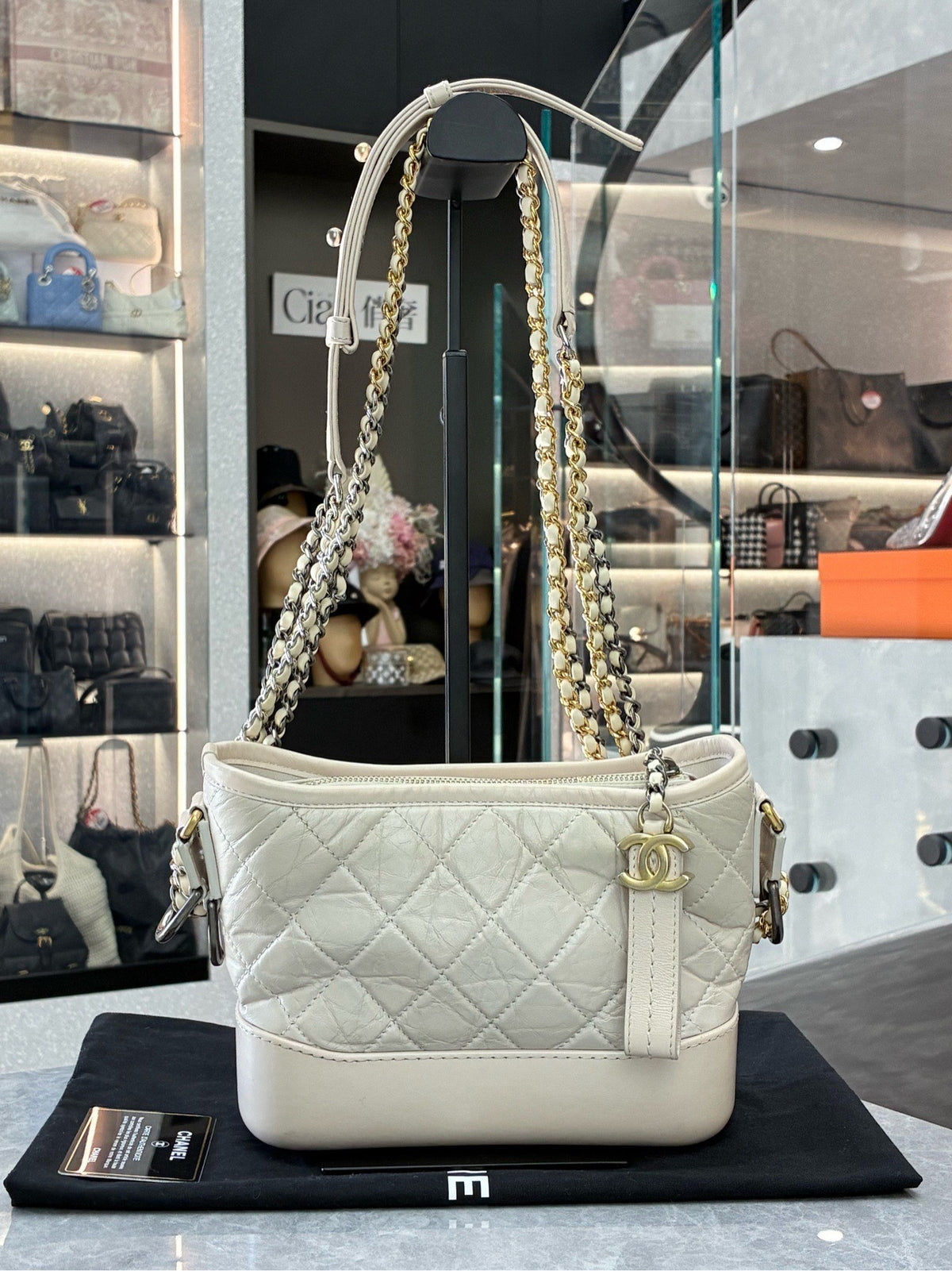 CHANEL Gabrielle Small Hobo – Cream Aged Calfskin with Mixed Gold and Silver Hardware, Series 26, Very Good Pre-Owned