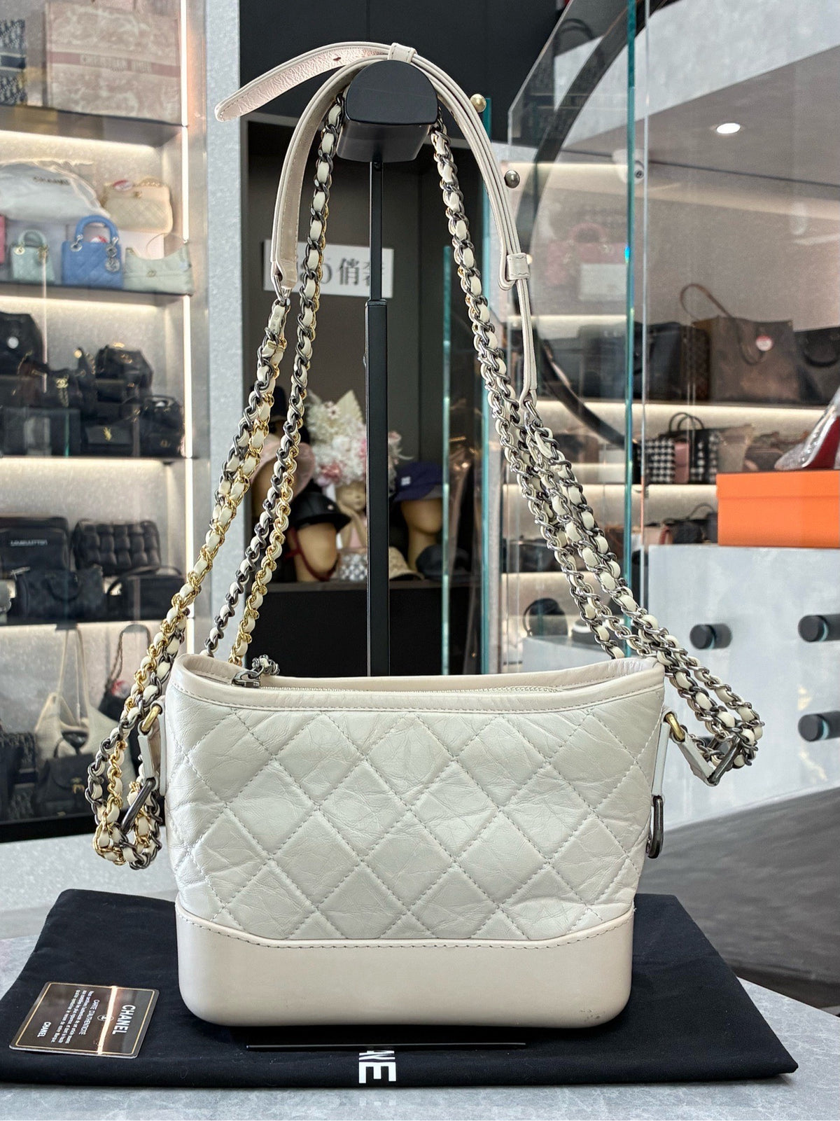 CHANEL Gabrielle Small Hobo – Cream Aged Calfskin with Mixed Gold and Silver Hardware, Series 26, Very Good Pre-Owned