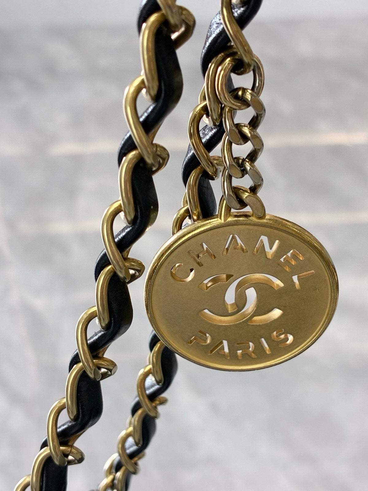 CHANEL 22 Small Hobo – Black Shiny Calfskin with Gold Hardware and Gilded CHANEL Letters, Excellent Pre-Owned