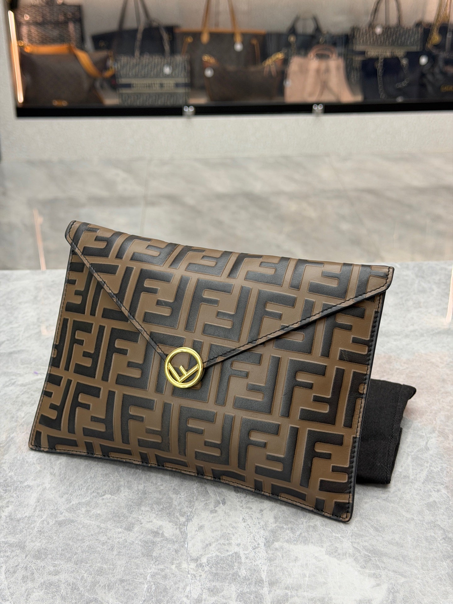 Fendi FF embossed envelope bag detail