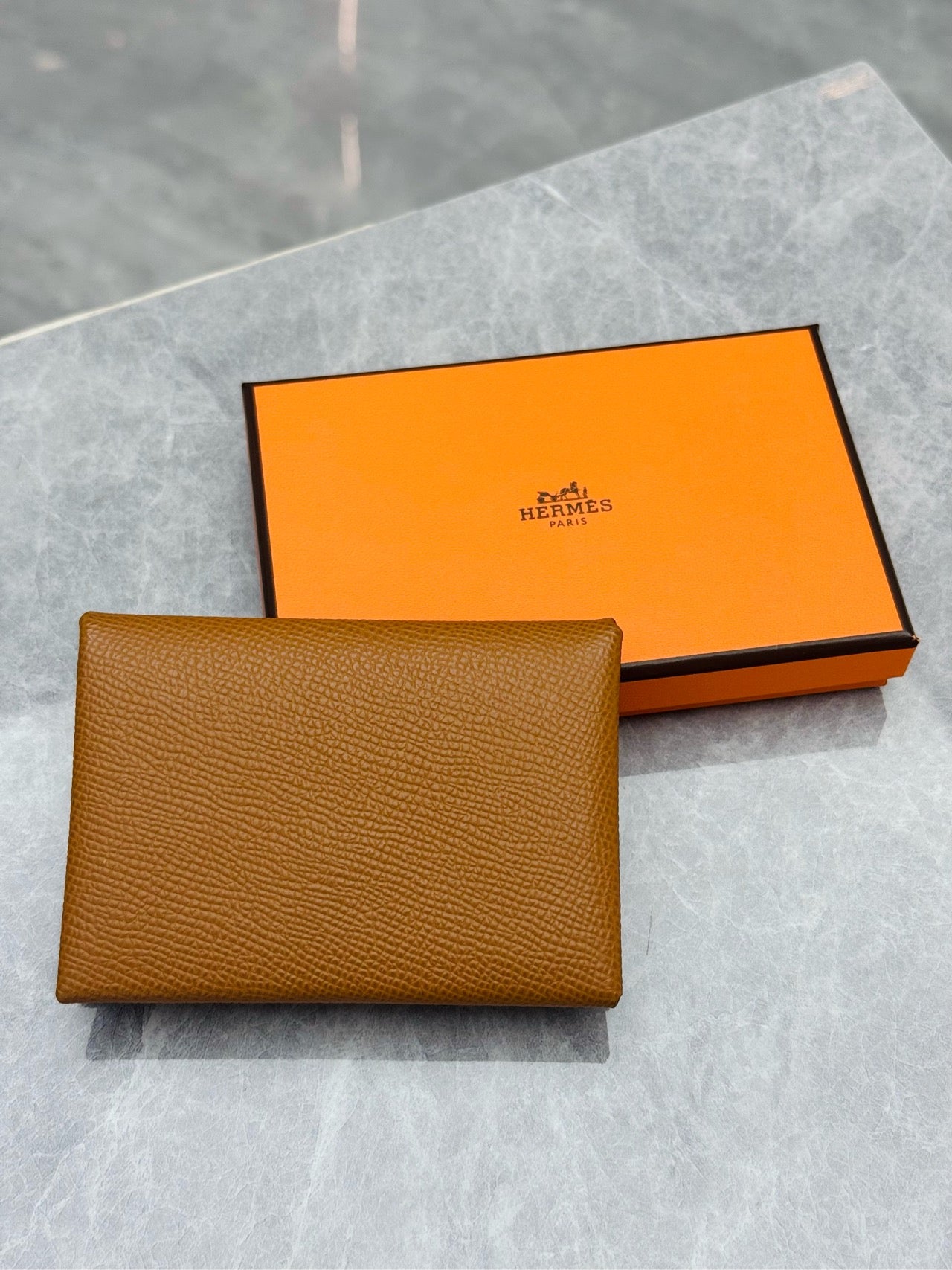 Hermès Calvi Duo card holder in Gold, rear view with original box