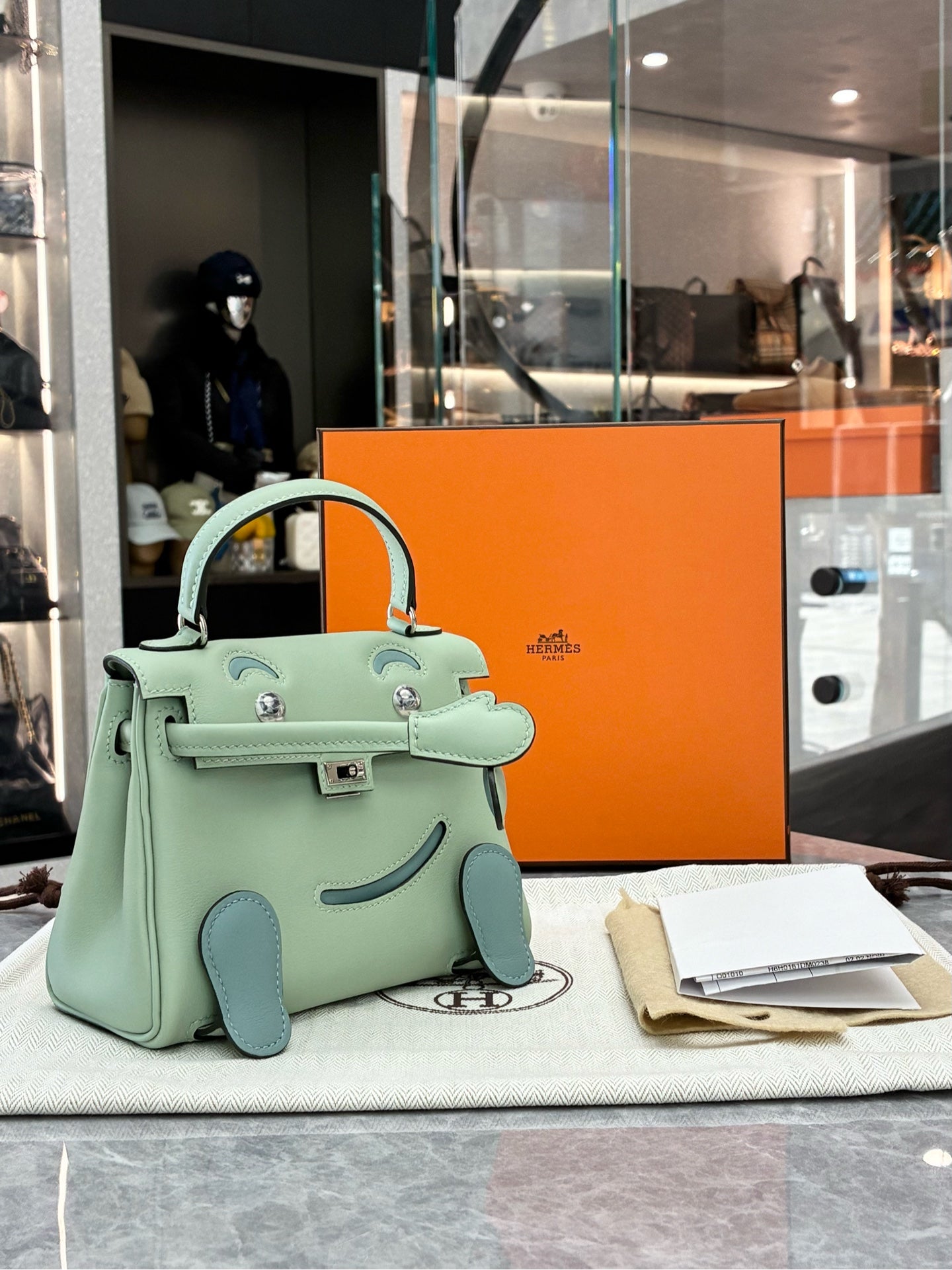 Hermès Kelly Doll Vert Menthe front view with palladium hardware