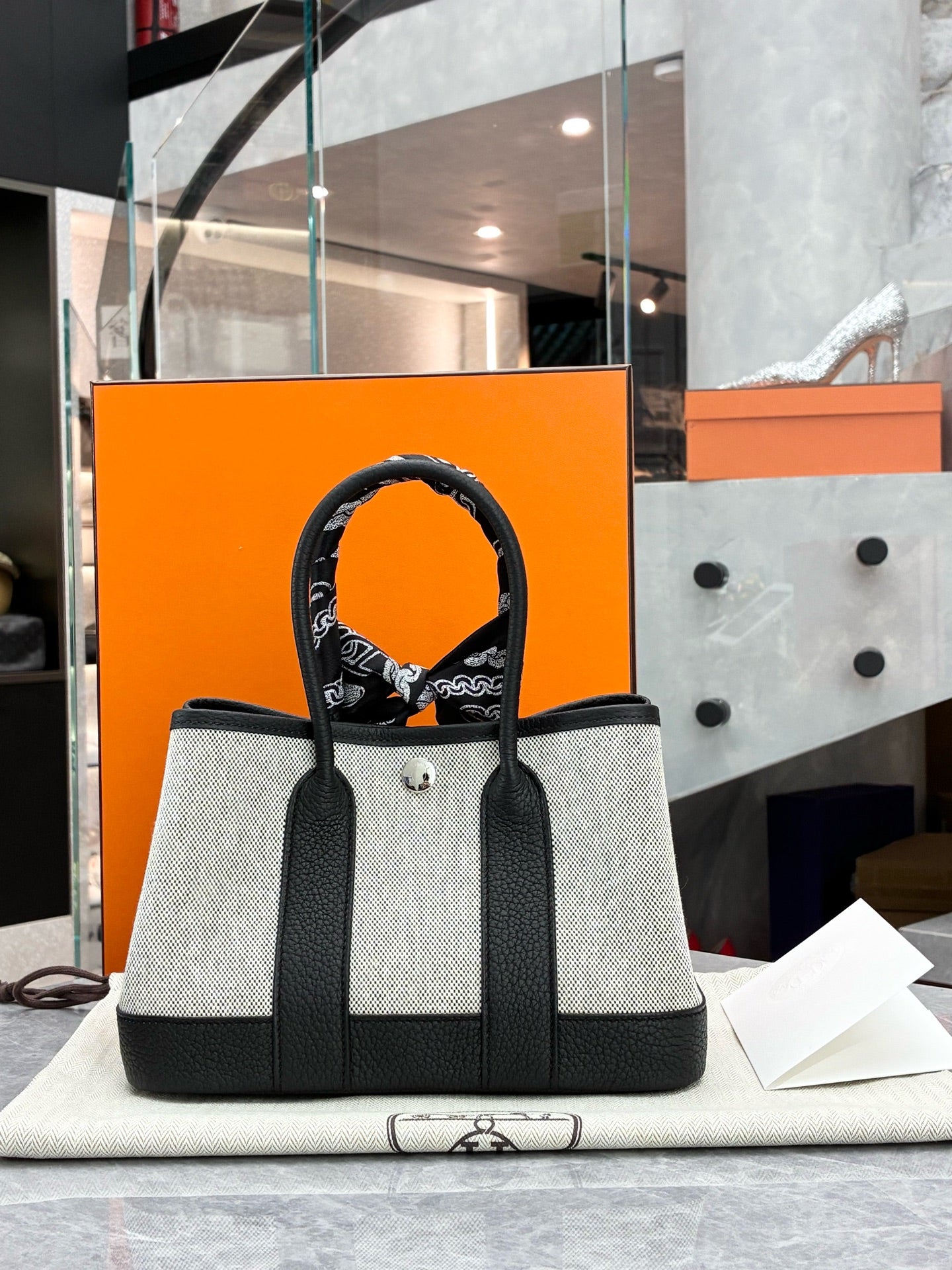 Hermès Mini Garden Party in black and white canvas, back view