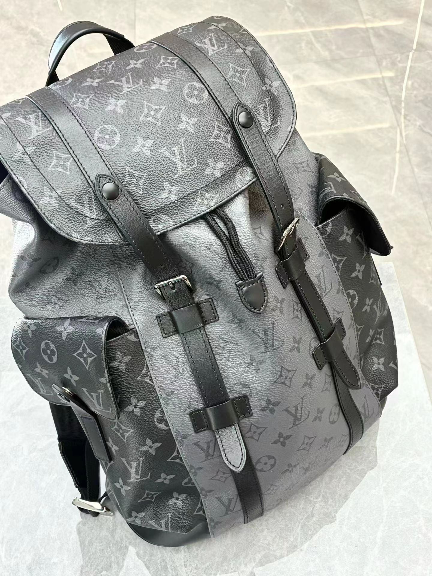LOUIS VUITTON Christopher MM Monogram Eclipse backpack angled view